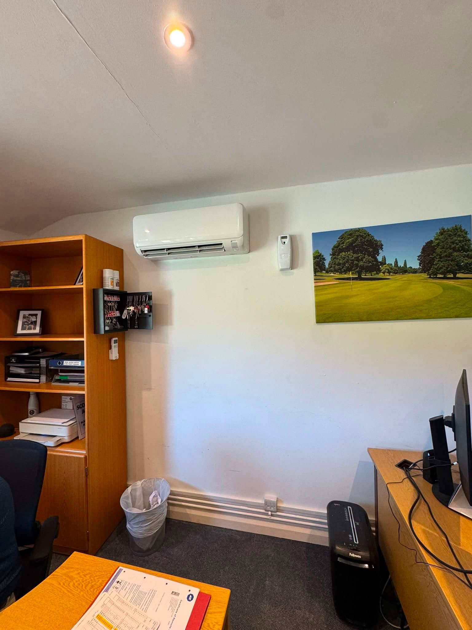 Wall-mounted air-conditioning unit in an office at Lilleybrook Golf Club, Cheltenham