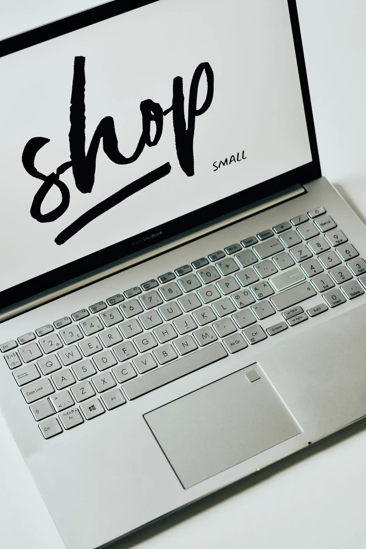 Laptop displaying the words shop small