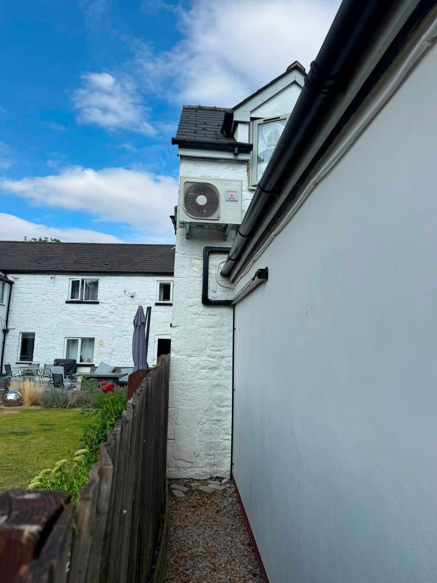 Outdoor air-conditioning unit mounted on a building exterior